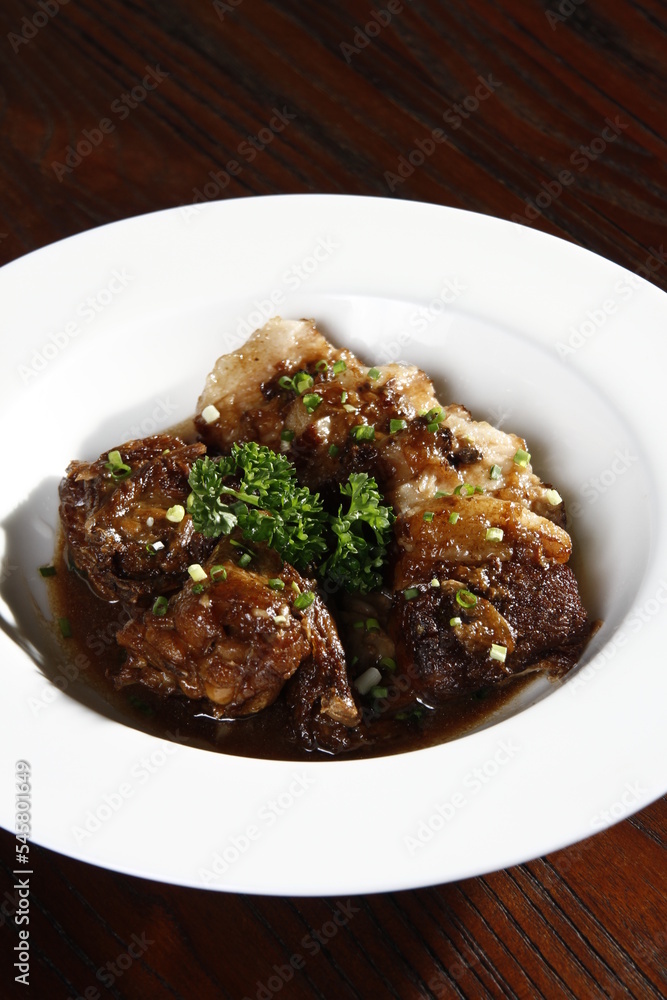 Chicken and pork adobo - Filipino dish Chicken and pork adobo - Filipino dish