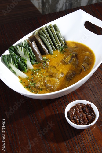 Kare-kare with bagoong, a local Filipino dish photo