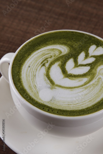 Matcha latte closeup with foam art
