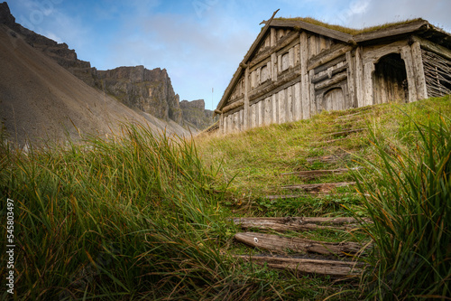 Up view of the vikings longhouse at a viking village, mountains in the background, Stokksnes, Iceland