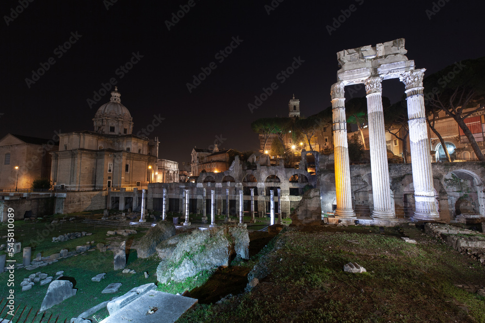 Rome, Italy, ruins of the old city at night with backlight.