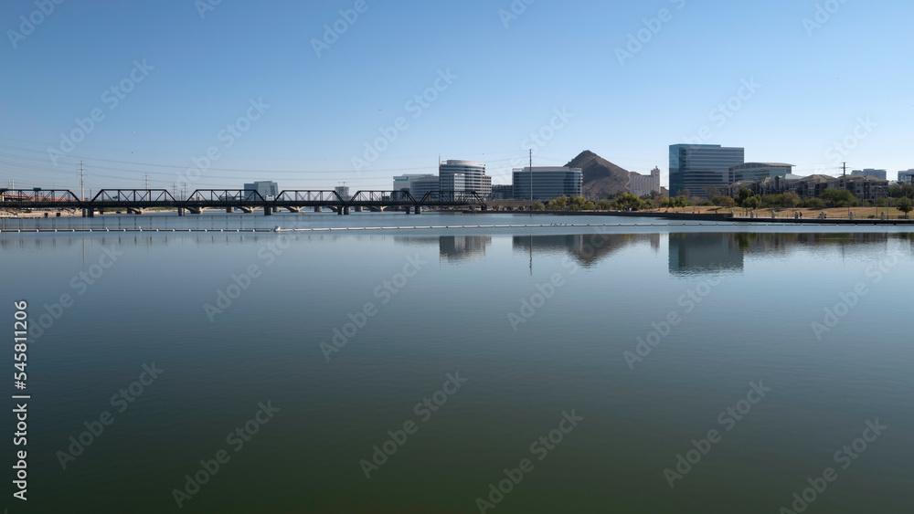 View of Tempe Arizona reflected on Tempe Lake on a calm clear day