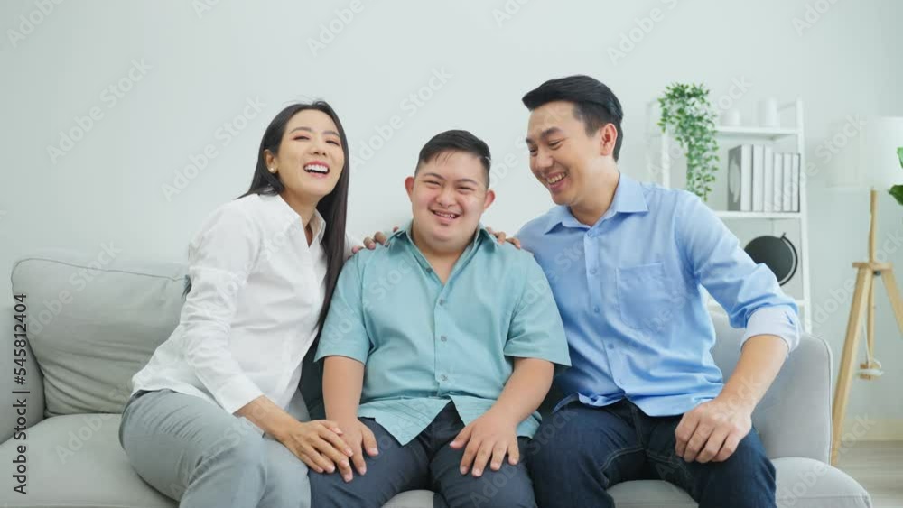 Portrait of attractive mature parent spend time with young son in home Portrait of attractive mature parent spend time with young son in home
