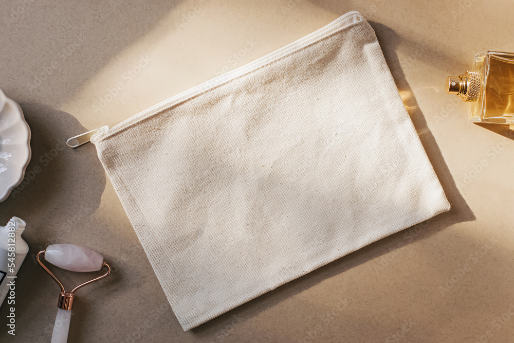 Blank canvas makeup bag mockup on a beige, cream background. Stock-Foto |  Adobe Stock