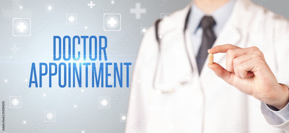 Close-up of a doctor giving a pill Close-up of a doctor giving a pill