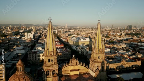 Wallpaper Mural Picturesque urban landscape with mighty spires of Cathedral. Drone footage of Guadalajara Plaza, surrounded with hilly landscape. High quality 4k footage Torontodigital.ca