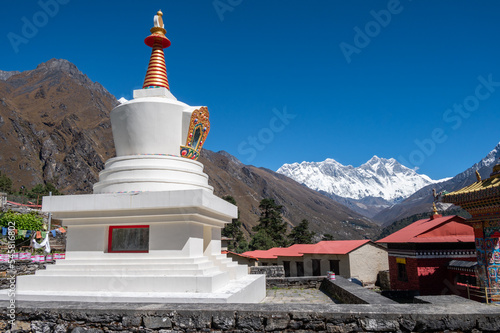 Tibetan Buddhism stupa in Tengboche monastery with beautiful view of Mt.Everest and Mt.Lhotse in the background.