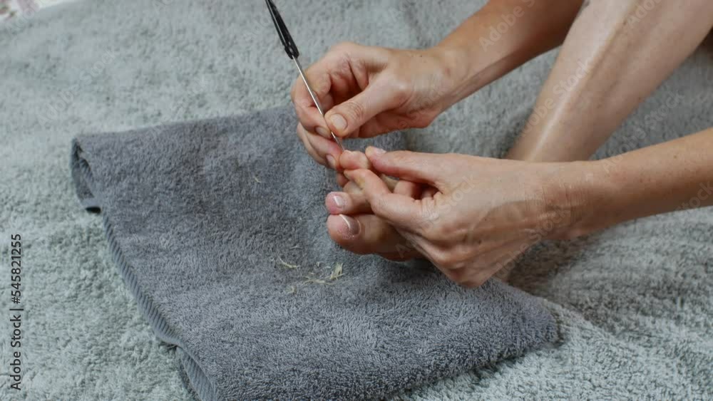 Close-up of a female feet pedicure. Foot nail care. Close-up of a female feet pedicure. Foot nail care.