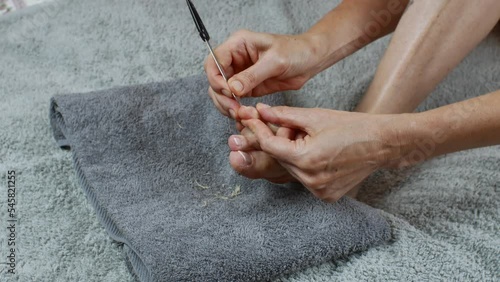 Close-up of a female feet pedicure. Foot nail care.