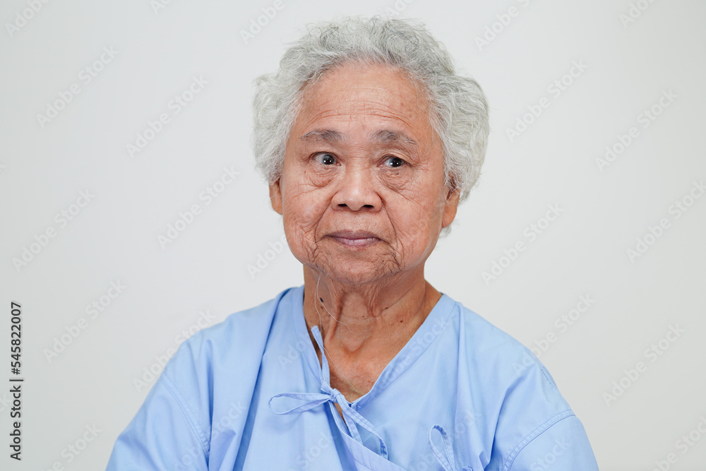 Asian elder senior woman patient sitting and smile face with happy on bed in hospital. Asian elder senior woman patient sitting and smile face with happy on bed in hospital.