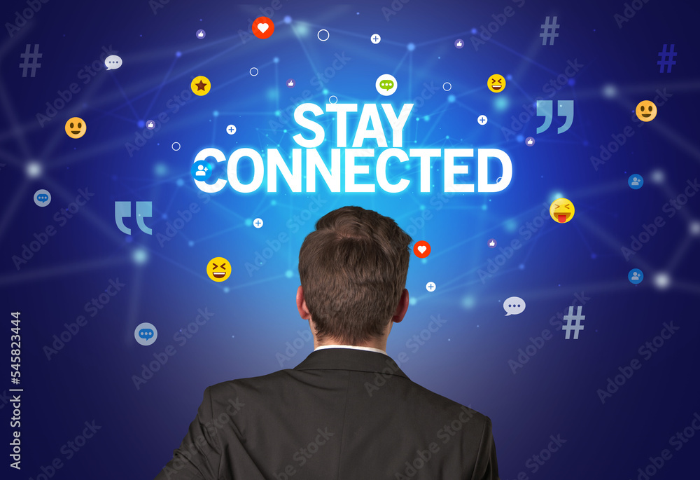 Rear view of a businessman, social media concept Rear view of a businessman, social media concept