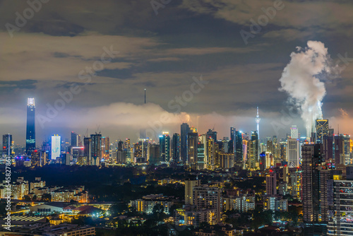 Cityscape of Kuala Lumpur, Malaysia during raining monsoon season © faizzaki