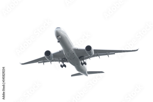 Passenger plane flying in the sky to destination on white background isolated air transport concept