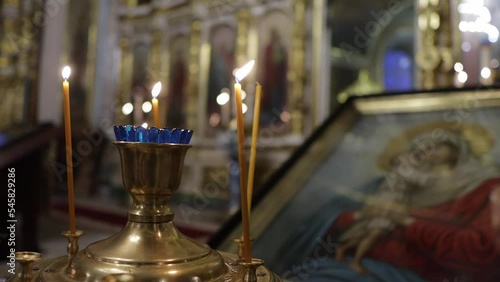 candles in an Orthodox church in front of an icon