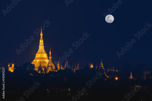 landscape scenery of Shwedagon pagoda on hill at fullmoon night famous sacred place and tourist attraction in Yangon Myanmar © Mongkolchon