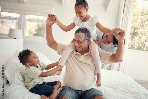 Foto Family, grandfather and piggy back on bed, having fun and bonding