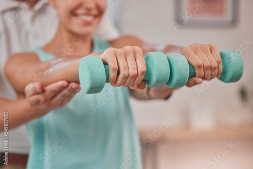 Rehabilitation, physiotherapy and weights of a woman patient in a healthcare clinic consultation. Doctor, hospital and physio arms treatment of a chiropractor for medical consulting and hands health
