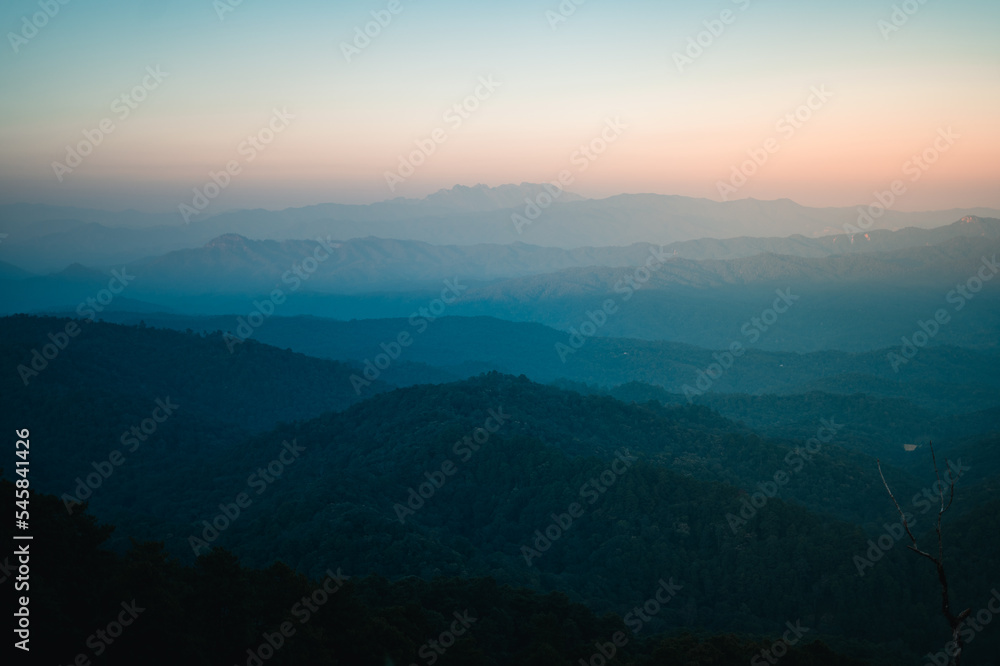 Scenic View Of Mountains During Sunset Scenic View Of Mountains During Sunset