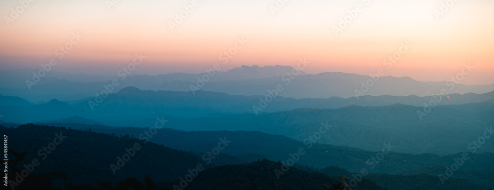 Scenic View Of Mountains During Sunset Scenic View Of Mountains During Sunset