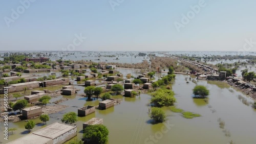 Aerial View Of Floods Surrounding Rural Buildings In Jacobabad, Sindh. Dolly Forward, photo