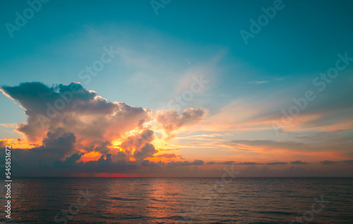 Sunset at the sea. Sunset at beach. Sunrise sea on tropical beach. Landscape of beautiful beach. Beautiful sunset at sea. Ocean sunset on sky background with colorful clouds.
