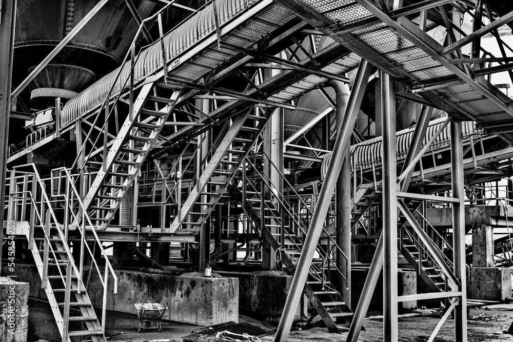 industrial plant of a sand mine in black and white industrial plant of a sand mine in black and white