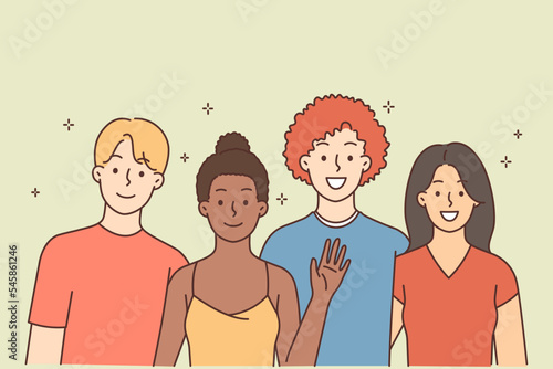 Smiling interracial group posing together 