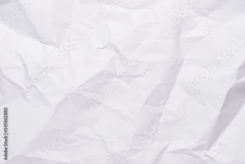 White crumpled paper texture background, clean white wrinkled paper, top view.