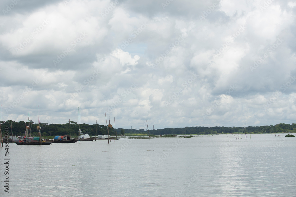 September 12 2020, Babuganj, Barisal, Bangladesh.Small fishing boats are floating in the river