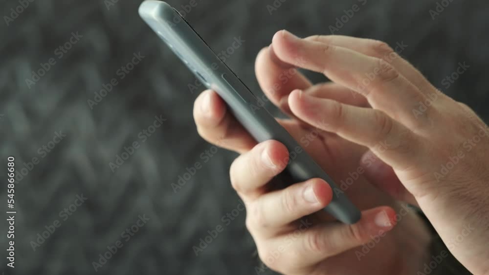 Modern smartphone in hands. Man surfing on the internet via mobile phone Modern smartphone in hands. Man surfing on the internet via mobile phone