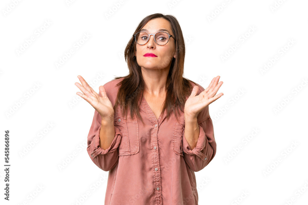 Middle-aged caucasian woman over isolated background making doubts gesture Middle-aged caucasian woman over isolated background making doubts gesture