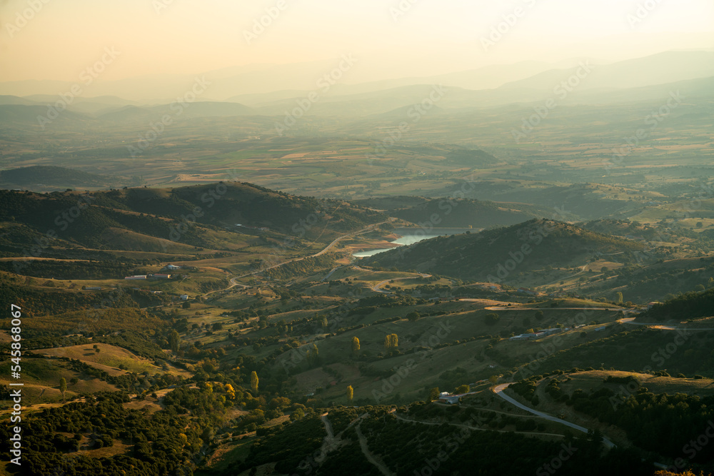 View of the landscape of central Greece as seen from the Mount Olympus massif at sunset