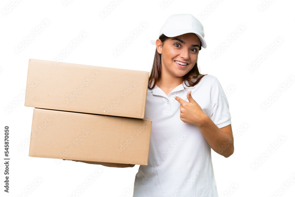 Delivery caucasian woman holding boxes isolated on green chroma background with surprise facial expression Delivery caucasian woman holding boxes isolated on green chroma background with surprise facial expression