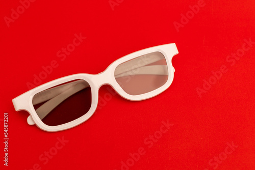 Movie glasses on a red background
