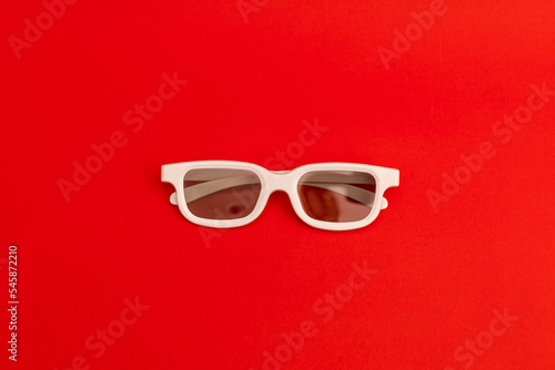 Movie glasses on a red background