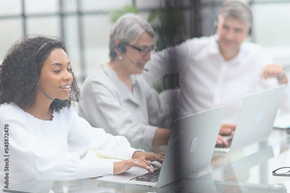Business group working in customer and help desk office Business group working in customer and help desk office