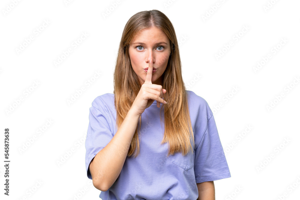Young beautiful woman over isolated background showing a sign of silence gesture putting finger in mouth Young beautiful woman over isolated background showing a sign of silence gesture putting finger in mouth