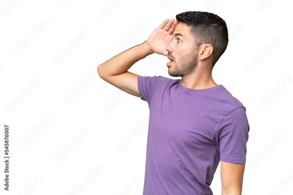 Young handsome caucasian man over isolated background with surprise expression while looking side Young handsome caucasian man over isolated background with surprise expression while looking side