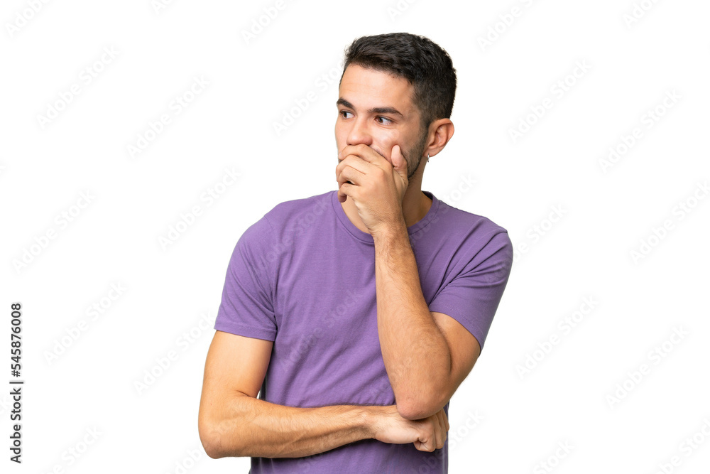 Young handsome caucasian man over isolated background with tired and bored expression Young handsome caucasian man over isolated background with tired and bored expression