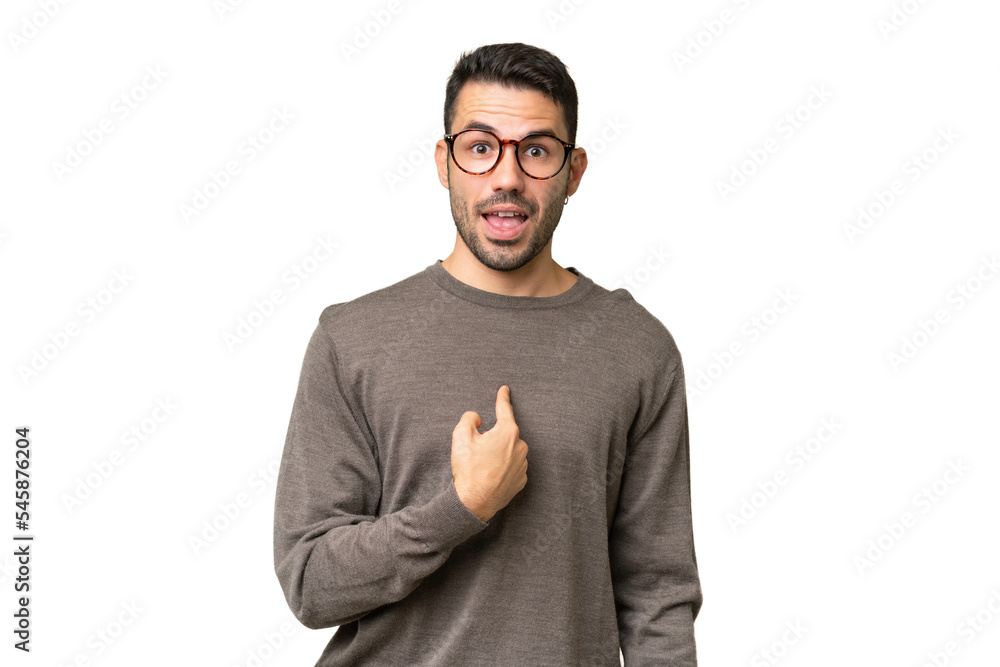 Young handsome caucasian man over isolated background with surprise facial expression Young handsome caucasian man over isolated background with surprise facial expression