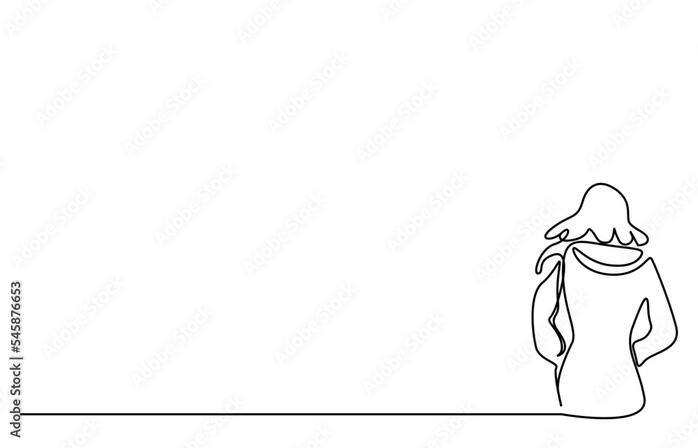 woman standing casually in winter clothes with her back turned calmly waiting thinking woman standing casually in winter clothes with her back turned calmly waiting thinking