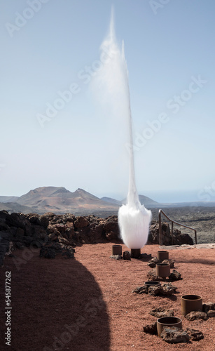 Spain, Canary Islands, Erupting geyser in Timanfaya National Park photo