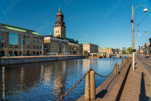 Sweden, Vastra Gotaland County, Gothenburg, Stora Hamnkanalen with bell tower of German Church in background photo