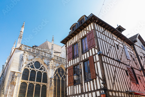 France, Grand Est, Troyes, Historic half-timbered house in front of Eglise Saint-Jean-au-Marche church photo