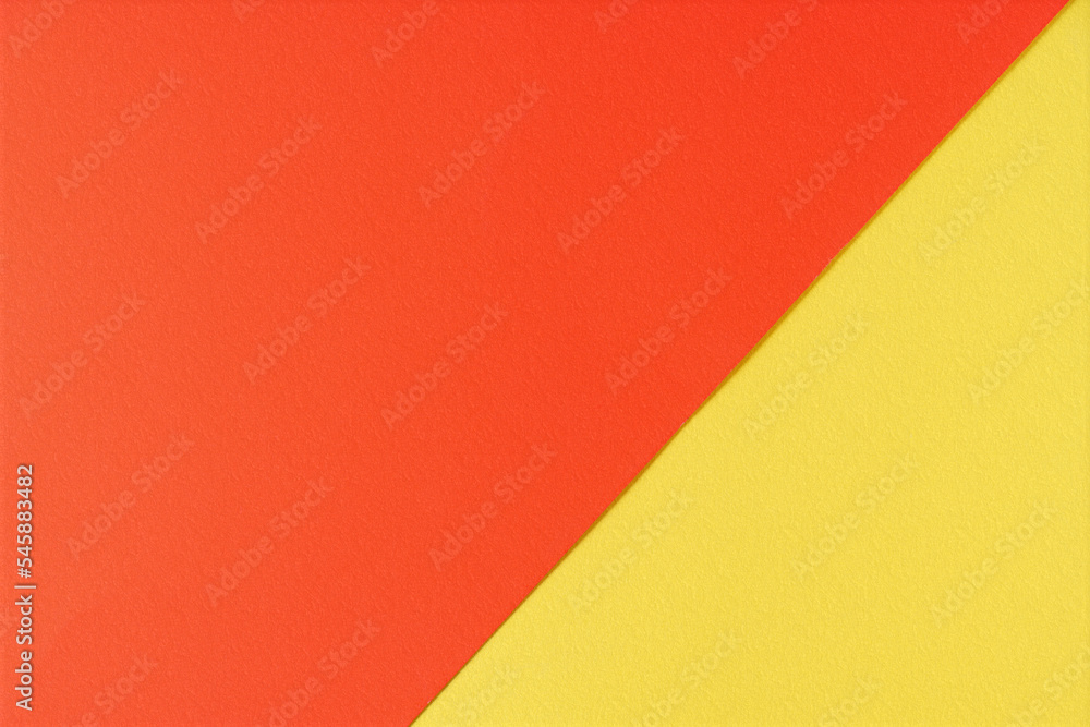 Background of yellow and red paper in bright colors, geometric pattern. Background of yellow and red paper in bright colors, geometric pattern.