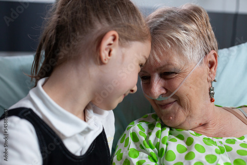 Foto Family members smiling happily at sanatorium nursing home