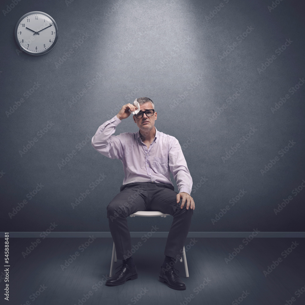 Anxious job candidate waiting for the interview Anxious job candidate waiting for the interview
