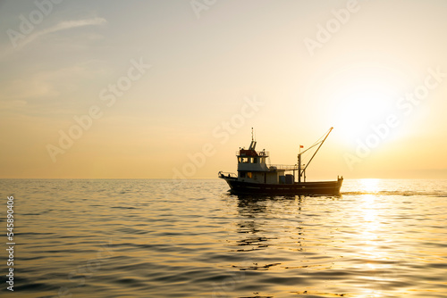 Beautiful Seascape while Sunset with Fishing Boat