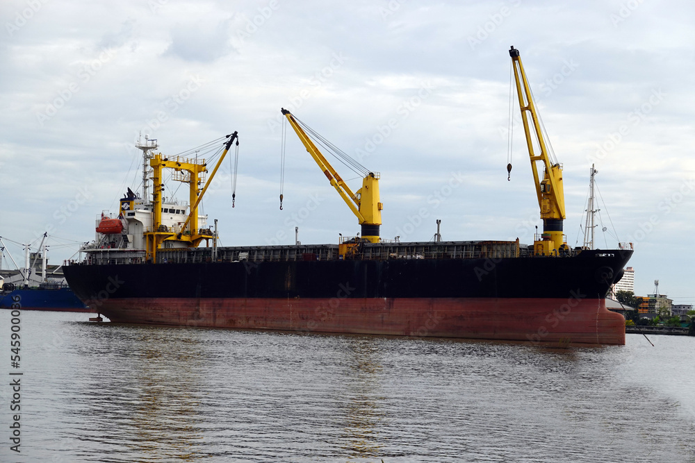 Container ship on Chao Phraya River, Bangkok, Thailand