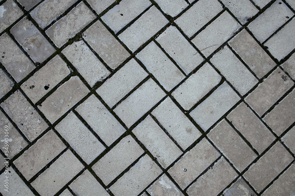 Old road paved with granite stones Old road paved with granite stones